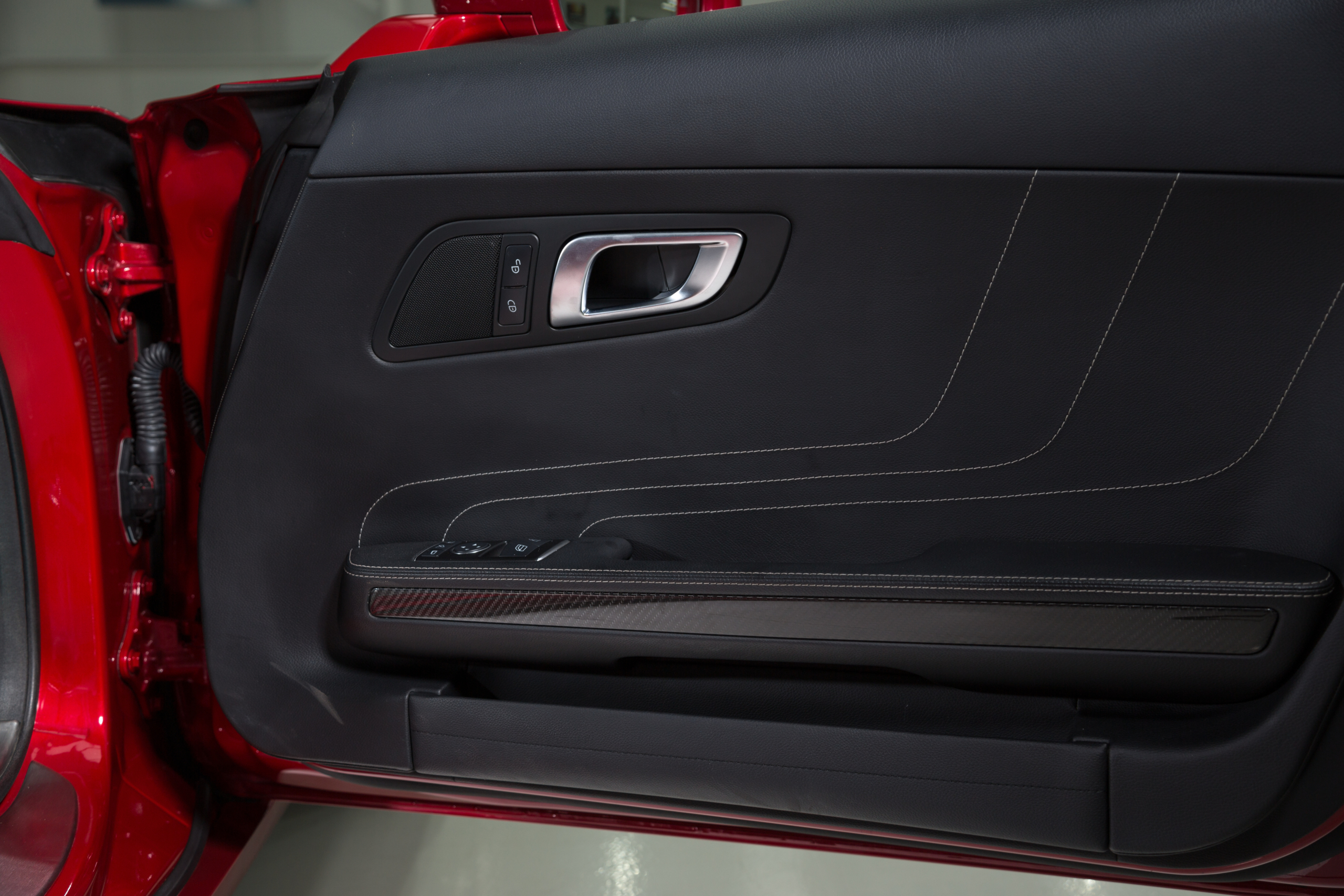 Black leather car door panel of luxurious car Automotive Leather Upholstery